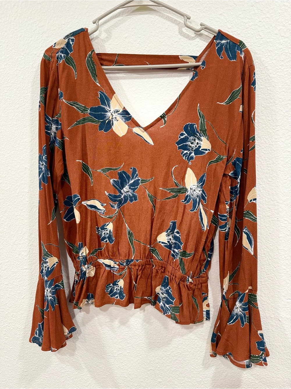 Lumiere Rust Floral V-Neck Peplum Blouse with Blue & Cream Blooms